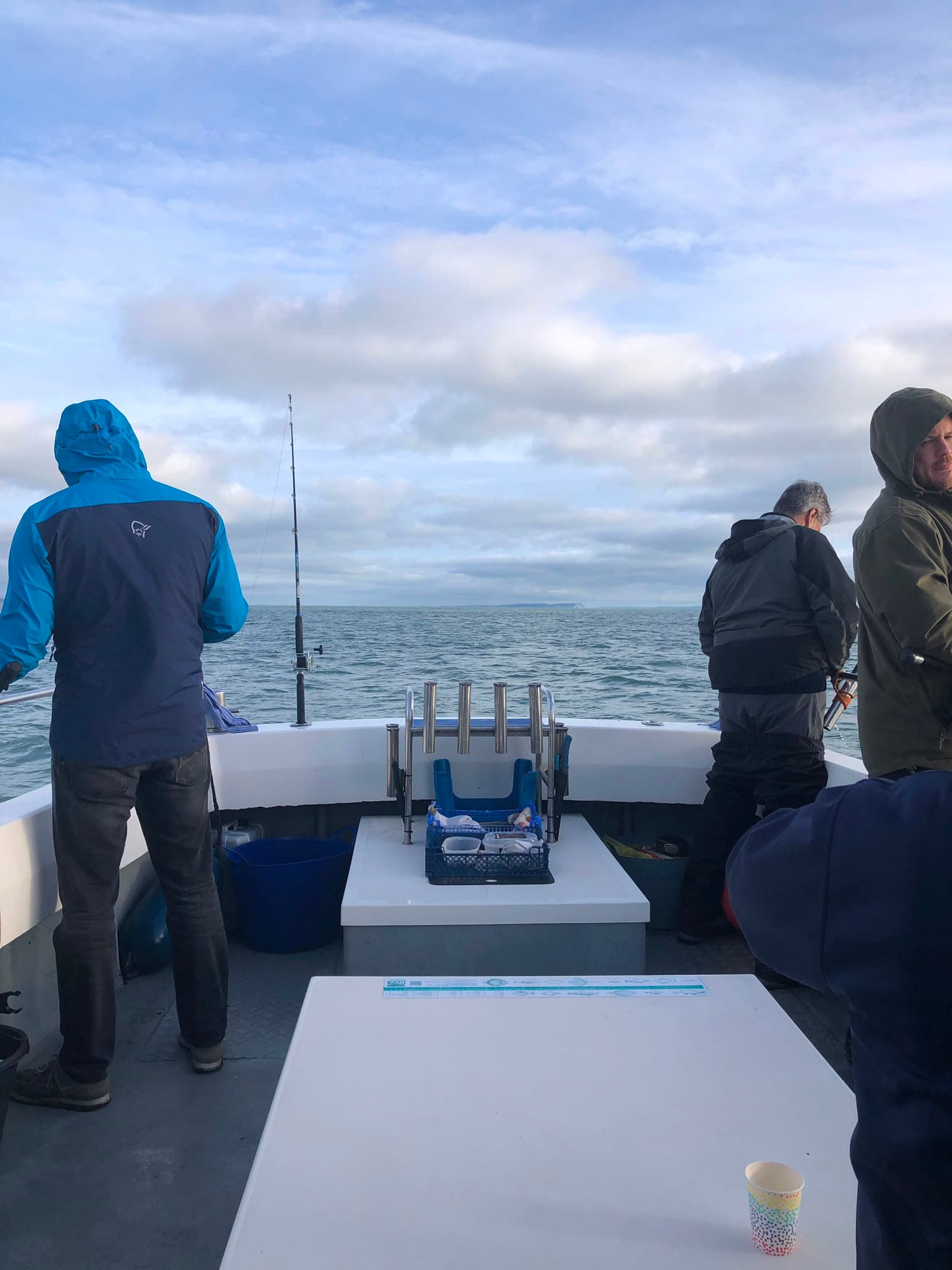 Anglers fishing from the back of Danny Boy 2 at sea